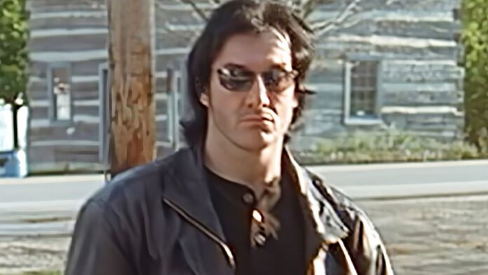 Miles Jonn Dalton with sunglasses and leather jacket.