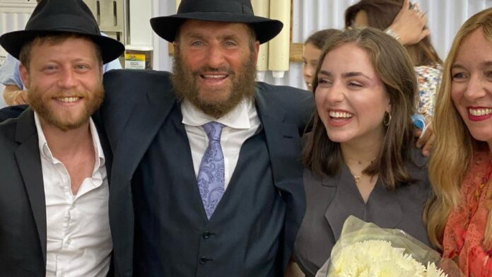 Rabbi Shmuley Boteach with his daughter and son.